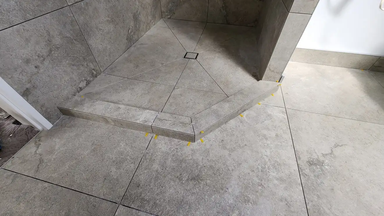 shower in gym - tiling project completed by Dakom Tiling